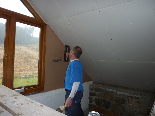 Mark busy with plaster work.